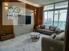 Furnished 2-bedroom apartment with a living room available for monthly rent in Al Waha Tower, Ajman.