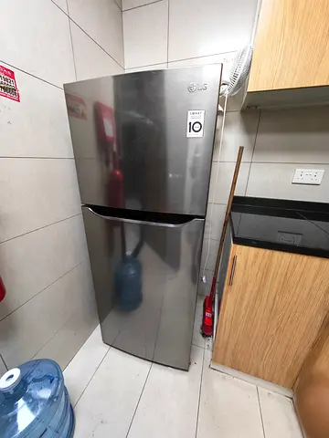 LG Stainless Steel Top-Freezer Refrigerator - Good Working Condition