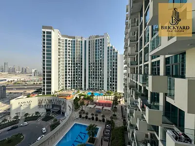 Furnished Studio | up to 12 cheques | Pool & City Views | Balcony