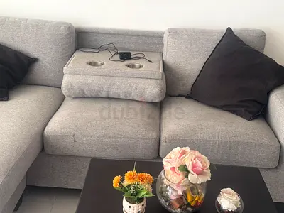 Light grey L-shaped fabric sofa (corner sofa) in good condition
