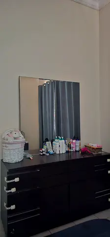 Dark wood dresser with mirror and six drawers - good condition