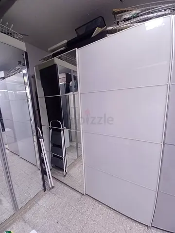 White sliding door wardrobe with mirrored panel - good condition