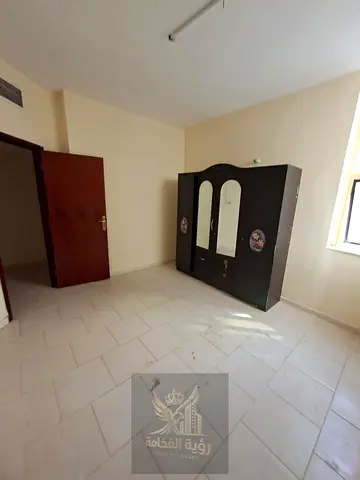 For rent in Al Butina Sharjah one bedroom and hall with distributor central AC and central gas AED 24000 yearly payment in 4 or 6 installments deposit