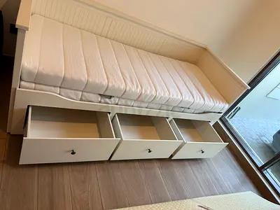 White daybed bed frame with under-bed storage drawers