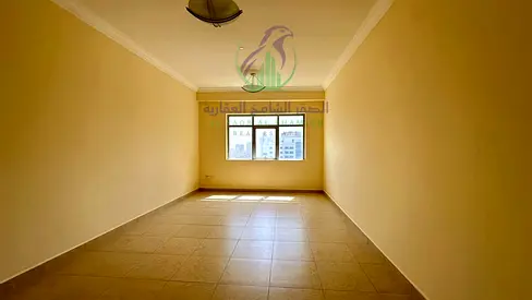 **Spacious 1-bedroom apartment with modern finishes, a balcony with an open view, and a generous layout. Located in a prime area of Al Taawun,