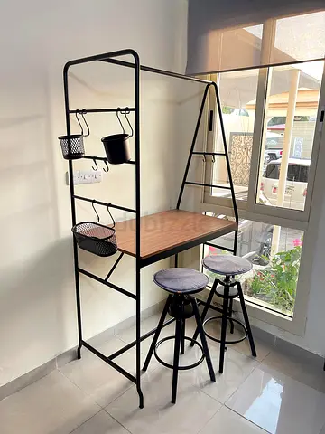Metal frame bar table with stools and hanging storage