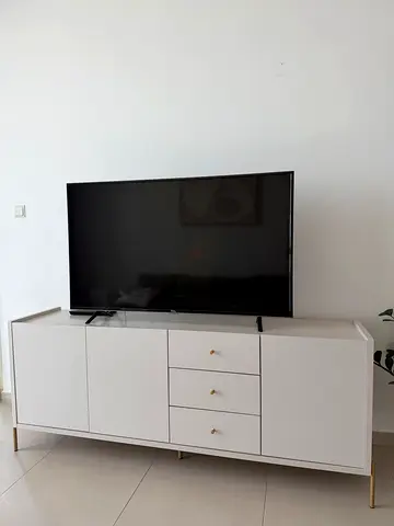 White modern TV cabinet / entertainment unit with storage