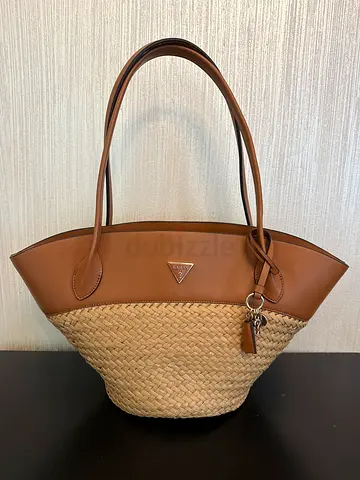Brown straw tote bag with shoulder straps