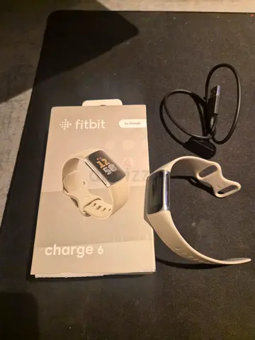 Fitbit Charge 6 with original band and charger - perfect condition