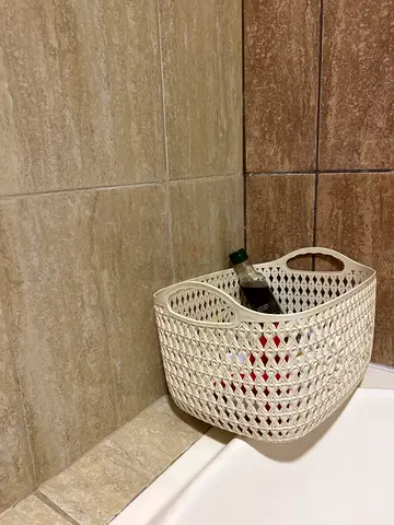 White woven plastic laundry basket / storage bin (good condition)