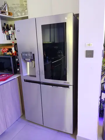 LG Stainless Steel 4-Door Refrigerator with InstaView and Water Dispenser - Excellent Condition