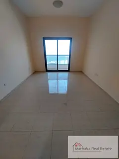 Spacious 1-Bedroom Hall Apartment with Balcony & Central AC. Al Rashidiya 1, Ajman.