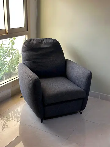 Comfortable dark grey single armchair — good condition