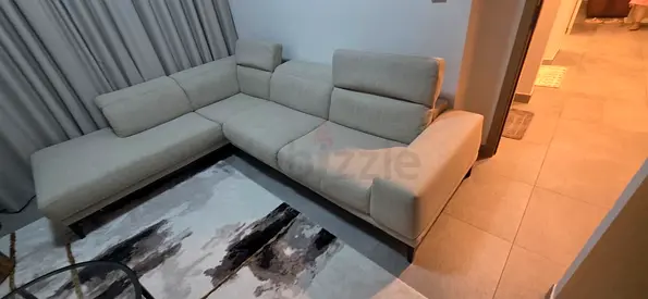 As Natuzzi Lsahpe sofa beige color like new