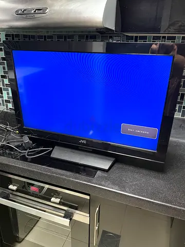 JVC 22-inch TV with remote and cables - good working condition