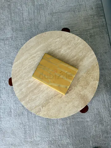 Round marble-top side table with wooden legs