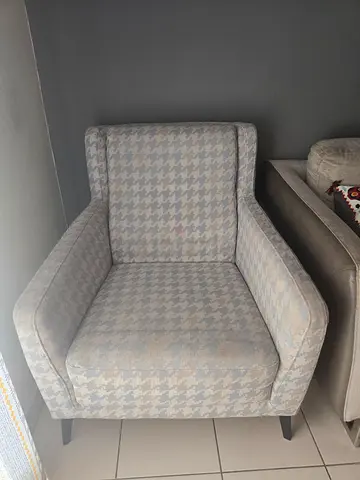 Light blue patterned single armchair in good condition , can be upholstered by buyer. Structure is v