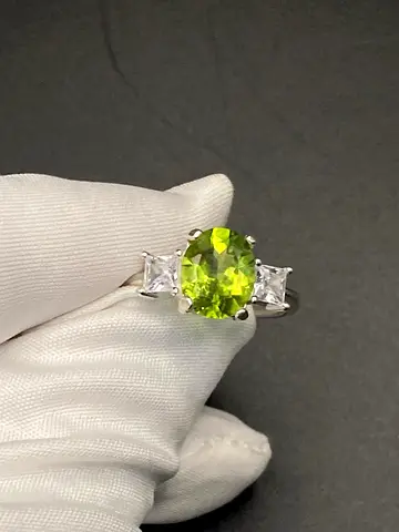 Sterling Silver Ring with Bright Peridot Center and Side Stones, Size Unknown