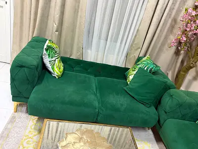 Green velvet 5-seater sofa cum bed in excellent condition