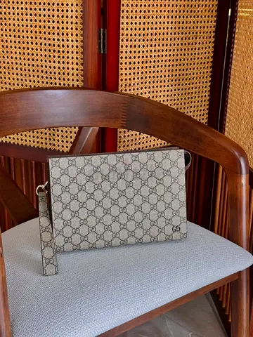 Gucci men's hand clutch