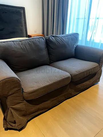 Grey 2-seater sofa with removable covers - good condition