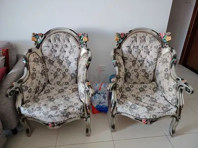 Pair of vintage floral carved wooden armchairs - good condition