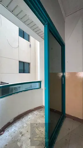 Spacious two-bedroom apartment with a living room for annual rent in Al Majaz 1 Sharjah located on