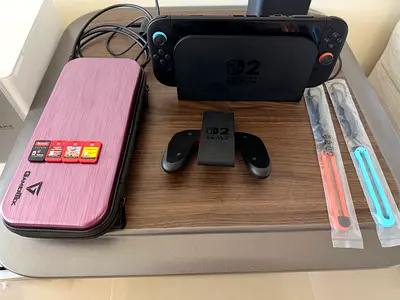Nintendo Switch 2 + 4 Games, Dock & Carrying Case