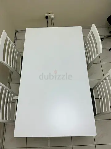 White dining table with 4 chairs - simple modern set