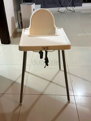 IKEAA white baby high chair with safety straps