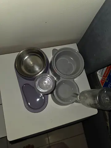 Used mixed pet bowls and gravity water dispenser - 2