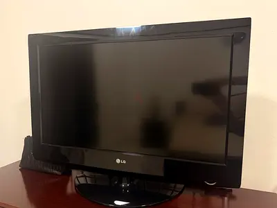 Used flat panel TV (back view) with AV inputs