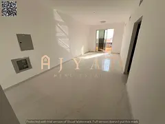 Brand-new 1BR in Al Mowaihat 3, near Exit 311. 2 baths, central AC, balcony, 1,150 sqft, premium fin