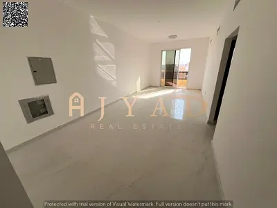 Brand-new 1BR in Al Mowaihat 3, near Exit 311. 2 baths, central AC, balcony, 1,150 sqft, premium fi