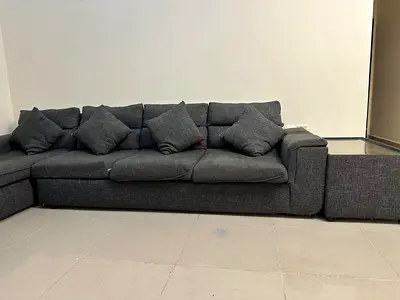 Large L-shaped Grey Fabric Sofa with Cushions - Good Condition