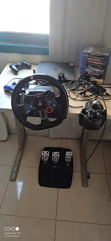 Ps4 slim with games and Logitech sim set