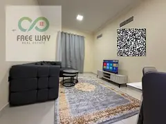 Furnished one-bedroom apartment with a living room for monthly rent in Ajman Al Muwaihat 2 area