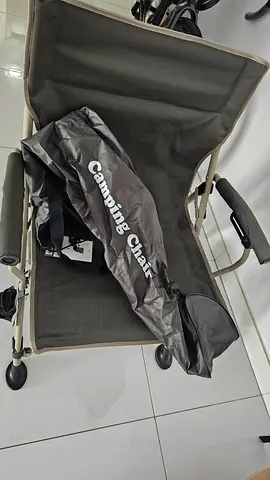 Foldable camping chair with carry bag - light used . Champion brand
