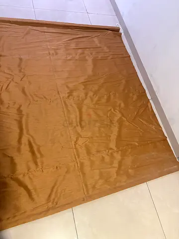Plain Caramel roller blind with black out