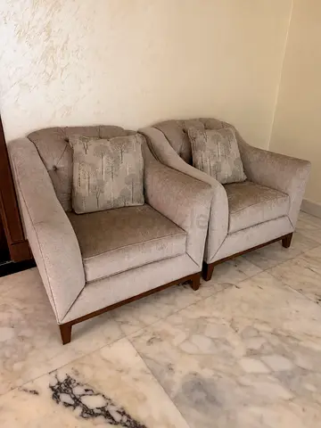 The one / Pair of beige upholstered armchairs with cushions -very good condition