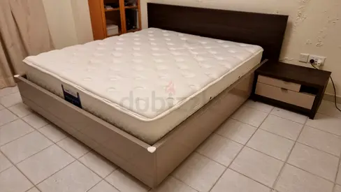 KING bed frame with mattress and matching bedside table - good condition