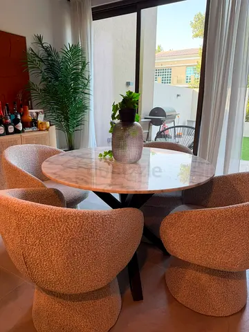 Dining table with swivel dining chairs