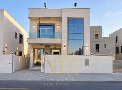 Al Zahia, Ajman – Villa with all-inclusive pricing; prime location amidst amenities; 5 master bedrooms with high-end finishes.