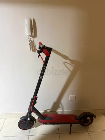 Red electric kick scooter - used, working condition