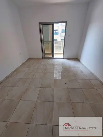 Spacious 1-Bedroom Hall Apartment with Balcony for rent in Al Rashidiya 1.