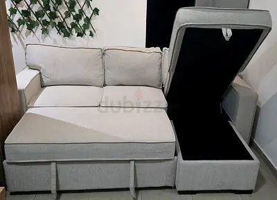 Light grey L-shaped storage sofa with chaise - good condition