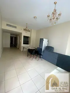 Two rooms for rent in Ajman One Towers (Al Rashidiya area). The unit features two master bedrooms wi