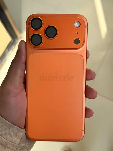 Orange iPhone-style smartphone with triple camera - good condition