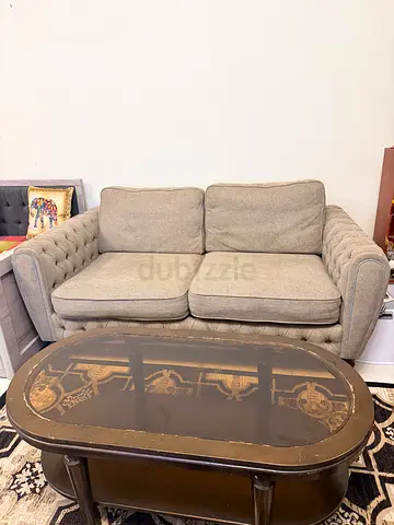 Light grey 2-seater upholstered sofa in good condition
