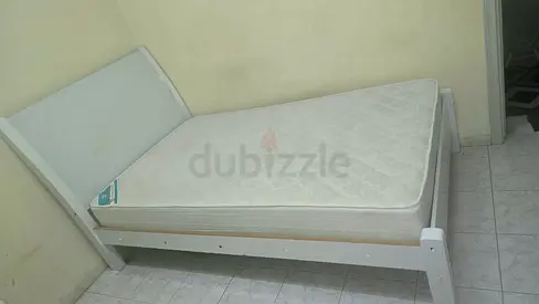 White wooden double bed frame with mattress - good condition